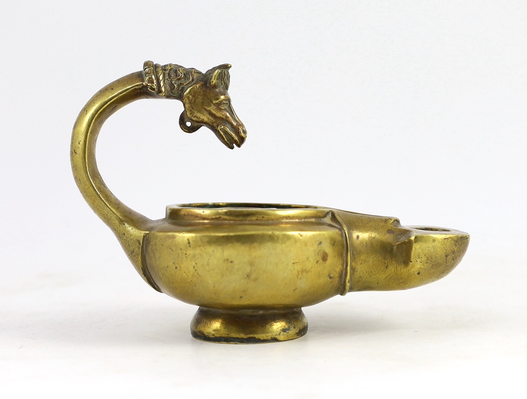 A Renaissance or Roman bronze oil lamp, 17.5cm long